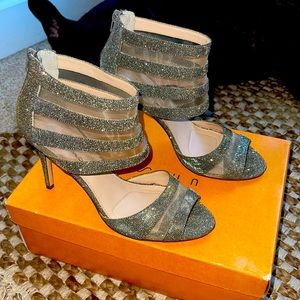 Sparkling silver cuff heels.